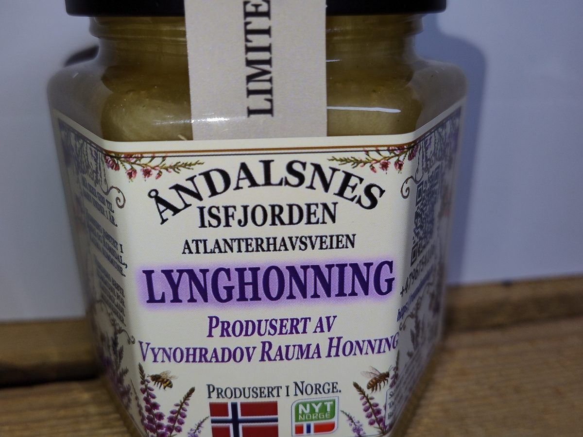 Glass jar of Rauma Honning heather honey (Lynghonning) with a hand-labelled Åndalsnes, Isfjorden, Atlanterhavsveien label